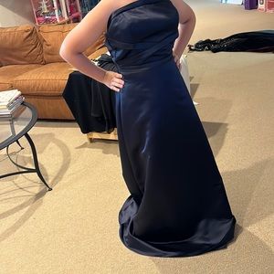 This dress can be worn to a wedding or to prom. It is a size 10.